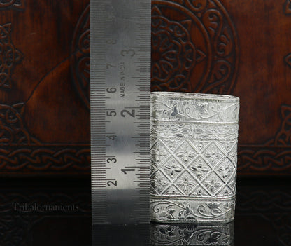 Handmade 925 sterling silver 2-in-1 tobacco and storage box by TRIBAL ORNAMENTS, with intricate silver utensils design.