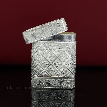 Handmade 925 sterling silver 2-in-1 tobacco and fennel storage box by TRIBAL ORNAMENTS, with intricate silver utensil detailing.