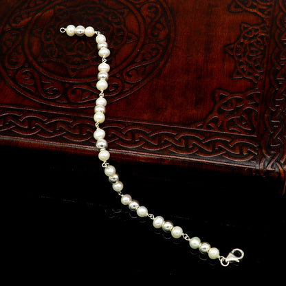 925 sterling silver round beads pearl bracelet by TRIBAL ORNAMENTS featuring handmade 5.5mm beads and stylish custom beaded jewelry.