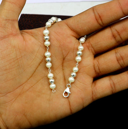 Sterling silver round beads pearl bracelet by TRIBAL ORNAMENTS, handmade beaded jewelry with 5.5mm beads, stylish and customizable.