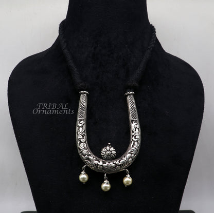 Sterling silver adjustable necklace from TRIBAL ORNAMENTS featuring traditional cultural design and delicate jewelry style.