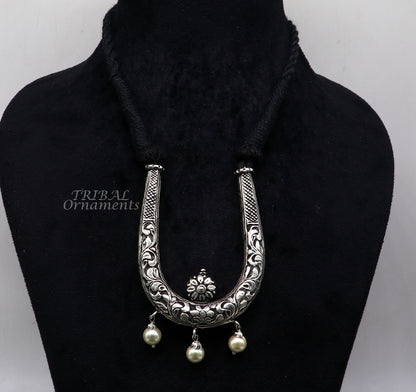 Sterling silver adjustable necklace from TRIBAL ORNAMENTS featuring traditional cultural design and delicate craftsmanship.
