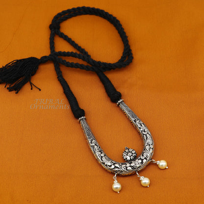 Sterling silver adjustable necklace from TRIBAL ORNAMENTS featuring traditional cultural design and delicate jewelry style.