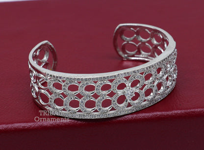Sterling silver cuff bracelet with cubic zirconia stones, adjustable design, handcrafted girl’s jewelry by TRIBAL ORNAMENTS.