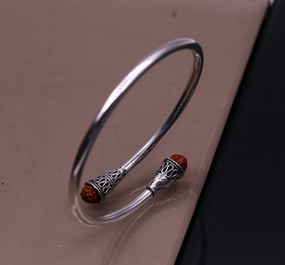 Sterling silver Rudraksha beads bangle cuff bracelet by TRIBAL ORNAMENTS, unisex adjustable jewelry with intricate handmade design.