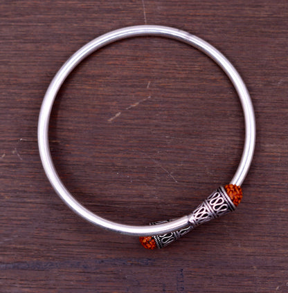 Unisex 925 sterling silver Rudraksha beads bangle cuff bracelet with adjustable design, handmade Indian jewelry from Tribal Ornaments.