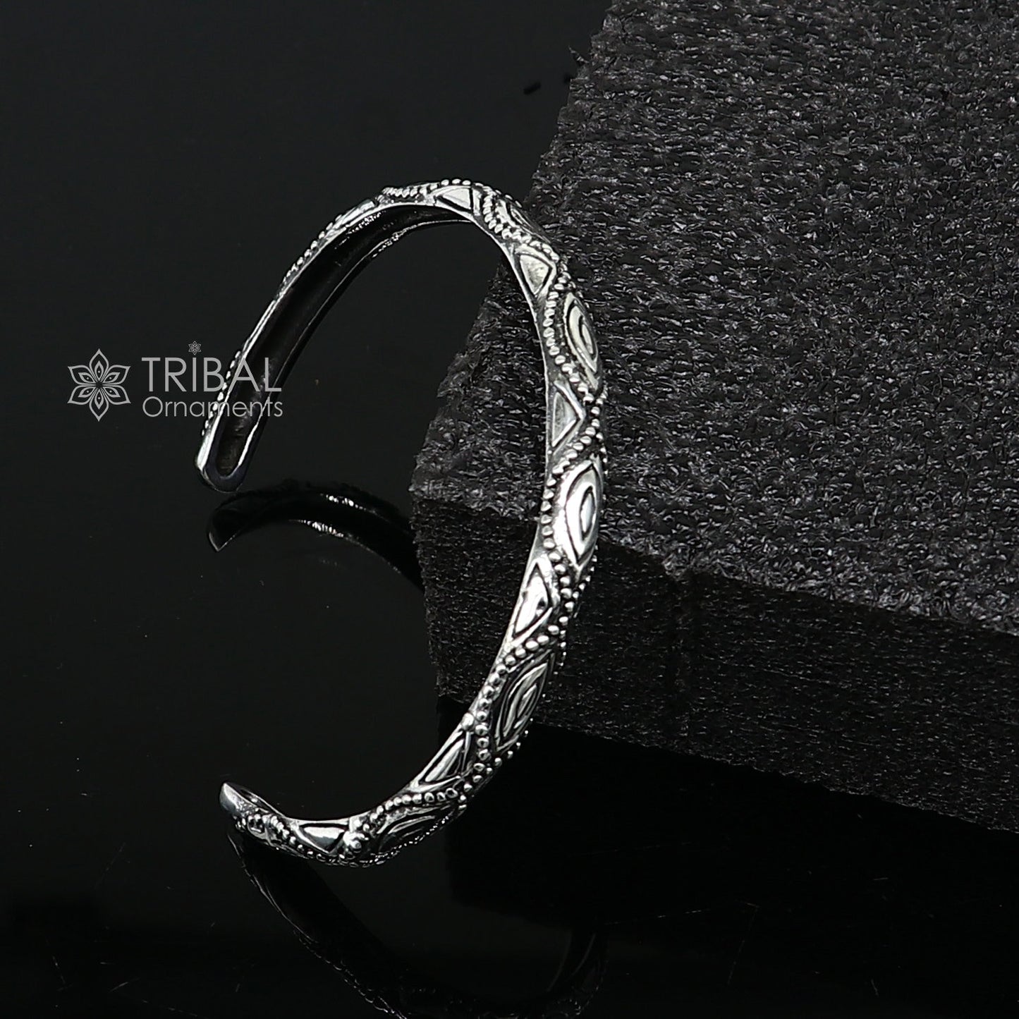 Sterling silver modern trendy unisex cuff bracelet by TRIBAL ORNAMENTS with adjustable, stylish design and intricate detailing.