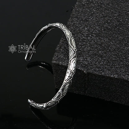 Sterling silver modern trendy unisex cuff bracelet by TRIBAL ORNAMENTS with adjustable, stylish design and intricate detailing.
