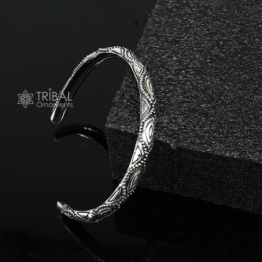 Sterling silver modern trendy unisex cuff bracelet by TRIBAL ORNAMENTS with adjustable, stylish design and intricate detailing.