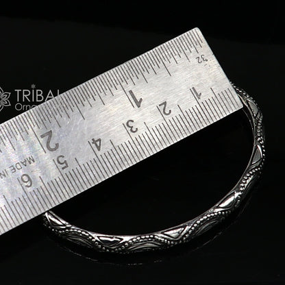 Sterling silver modern trendy cuff kada bracelet by TRIBAL ORNAMENTS, featuring sleek design, adjustable fit, for unisex jewelry.
