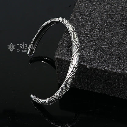 Sterling silver modern trendy cuff bracelet by Tribal Ornaments, adjustable unisex jewelry with intricate design and stylish finish.