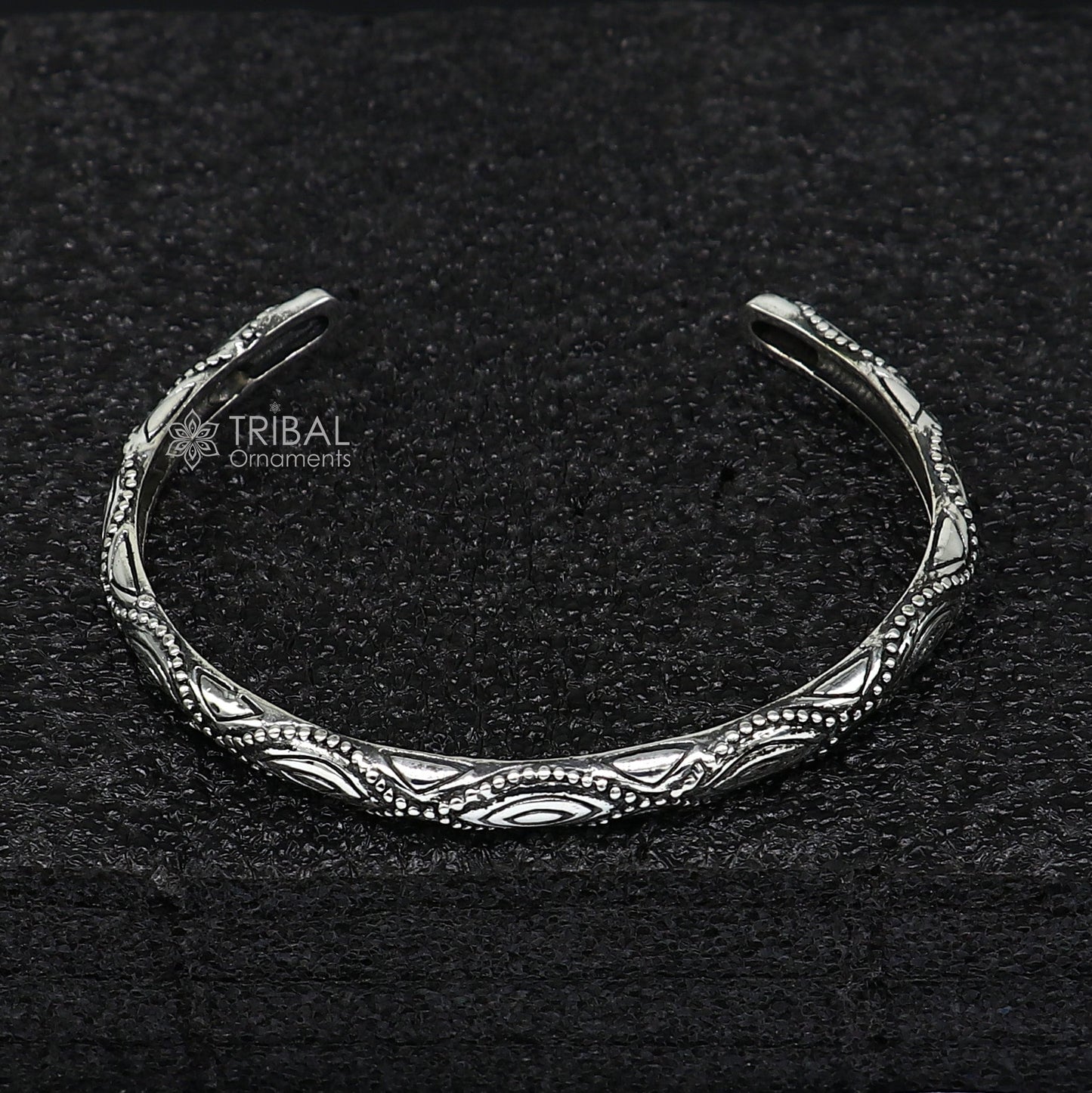 Sterling silver modern trendy cuff bracelet by TRIBAL ORNAMENTS, adjustable unisex kada jewelry with intricate design.