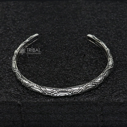 Sterling silver modern trendy cuff bracelet by TRIBAL ORNAMENTS, adjustable unisex kada jewelry with intricate design.
