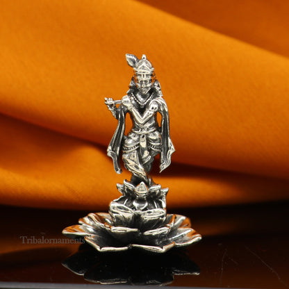 Sterling silver Lord Krishna idol with flute, handmade antique design, standing figurine for puja and decorative display.