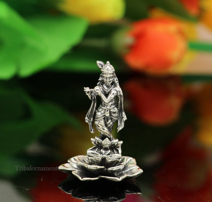 Sterling silver Lord Krishna idol with flute, handmade antique design, standing statue for puja and decorative gifting.