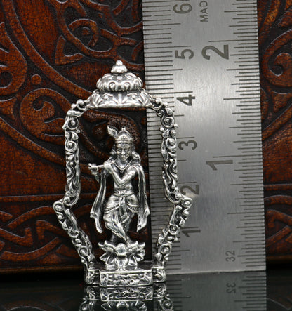 Sterling silver Lord Krishna idol with flute, handcrafted antique design, standing statue for puja or decorative gift by Tribal Ornaments