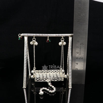 Handmade 925 silver Bal Gopala swing featuring Little Krishna and Laddu Gopal in intricate silver art design.