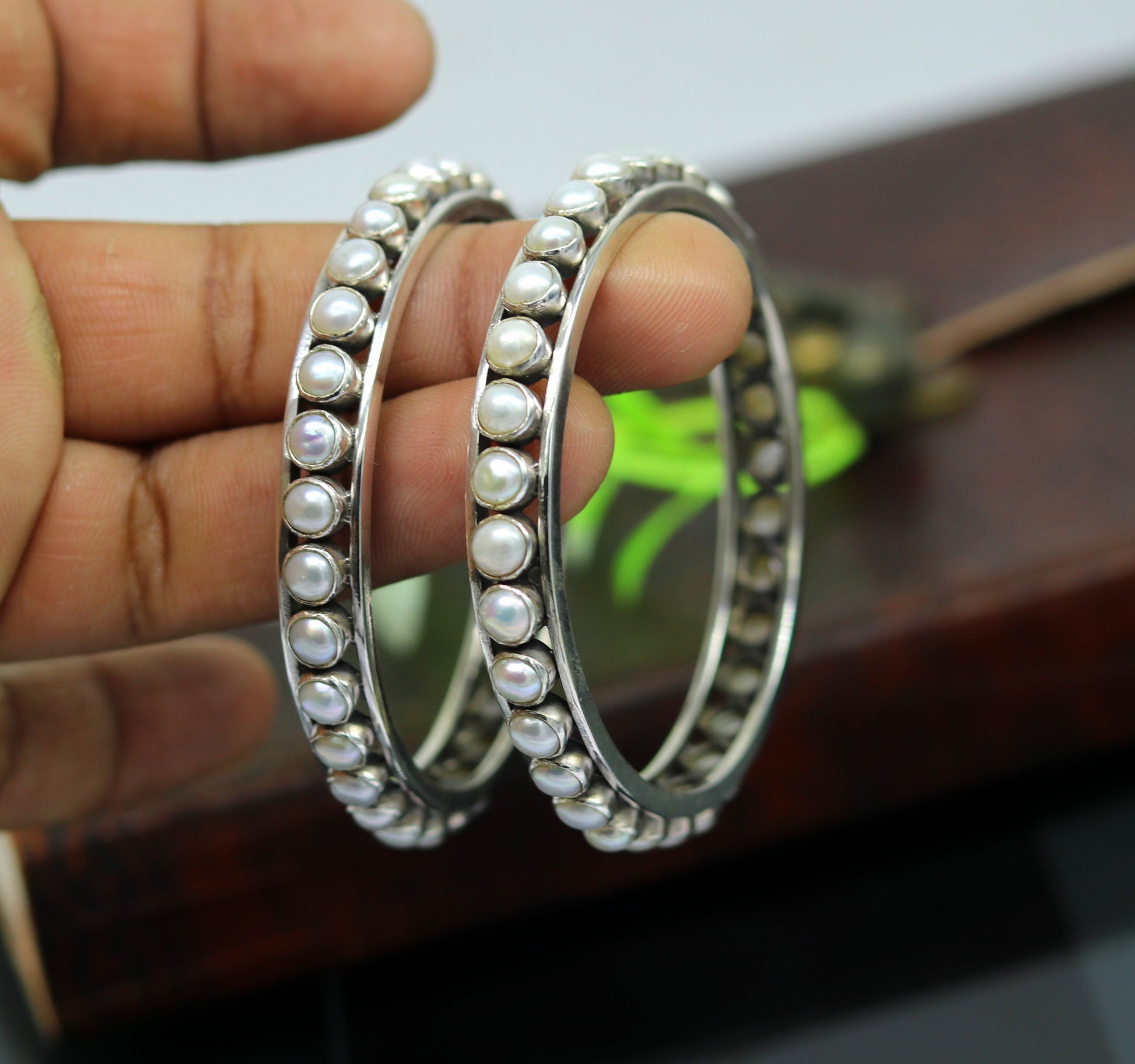 Sterling silver bangle with a natural pearl stone, stylish tribal jewelry by Tribal Ornaments, handcrafted and customized.