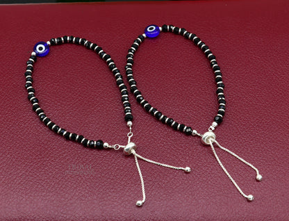 Handmade 925 sterling silver evil eye beaded bracelet by TRIBAL ORNAMENTS, adjustable girl’s jewelry with colorful beads from India.
