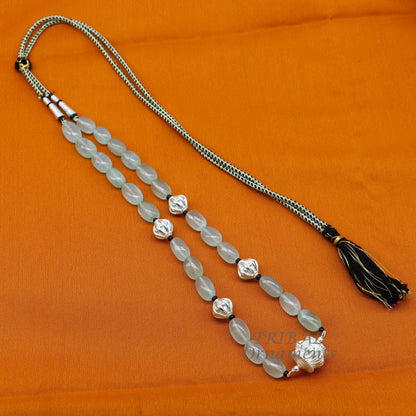 Sterling silver necklace with aqua quartz beads and silver accents, handmade tribal jewelry perfect for parties.