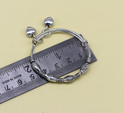 Sterling silver vintage-style adjustable baby bangles with beaded charm, handmade jewelry for newborns by TRIBAL ORNAMENTS.