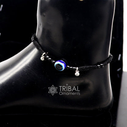 Sterling silver handmade ankle bracelet with evil eye beads, customized thread design, tribal style foot anklet for beach and casual wear.