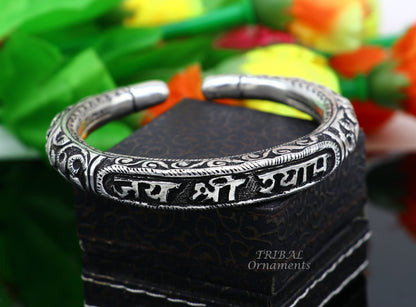Sterling silver handmade Lord Krishna mantra bracelet with chitai work, unisex tribal ethnic jewelry by TRIBAL ORNAMENTS.