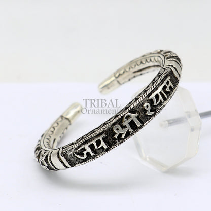 Sterling silver handcrafted Lord Krishna mantra bracelet or kada with tribal chitai work, unisex ethnic jewelry by Tribal Ornaments.