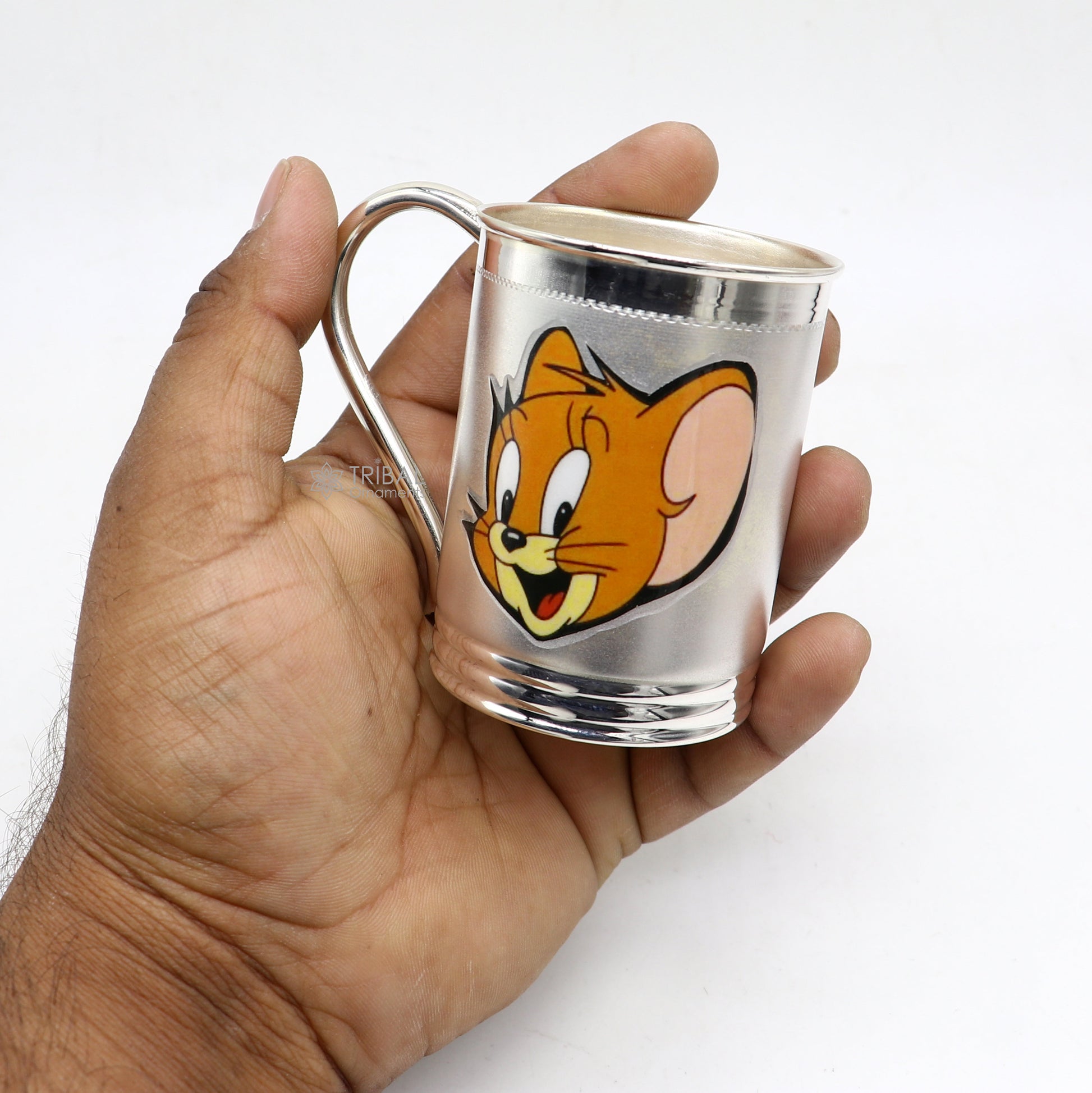 Handmade 925 sterling silver coffee cup and tumbler by TRIBAL ORNAMENTS with intricate tribal designs.