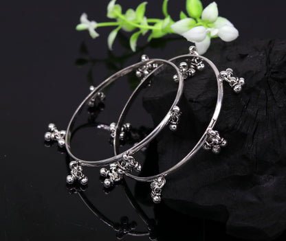 Sterling silver handmade bridesmaid bangle bracelet with hanging bells, personalized wedding jewelry from TRIBAL ORNAMENTS.
