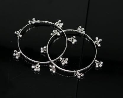 Sterling silver handmade bridesmaid bangle bracelet with hanging bells, personalized wedding jewelry by TRIBAL ORNAMENTS.