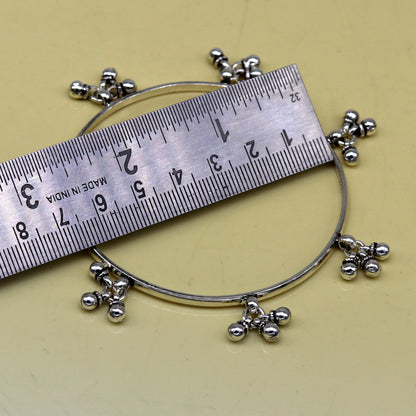 Sterling silver handmade bridesmaid bangle with hanging bells, customized wedding jewelry by TRIBAL ORNAMENTS.