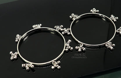 Sterling silver bridesmaid bangle bracelet with hanging bells, handcrafted by TRIBAL ORNAMENTS, personalized wedding jewelry.