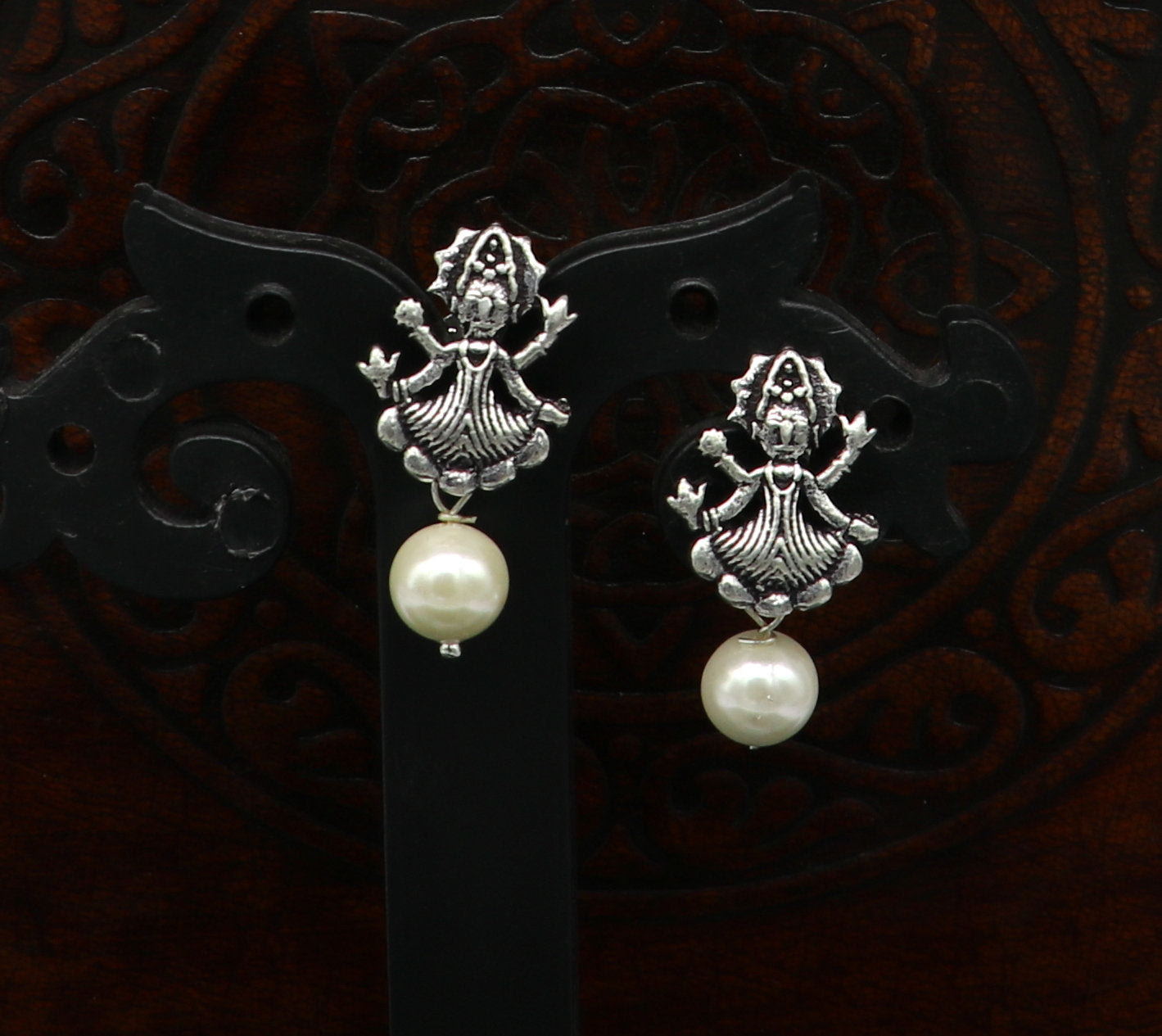 Sterling silver tribal deity goddess style stud earring with dangling mother-of-pearl, handmade designer jewelry by Tribal Ornaments.