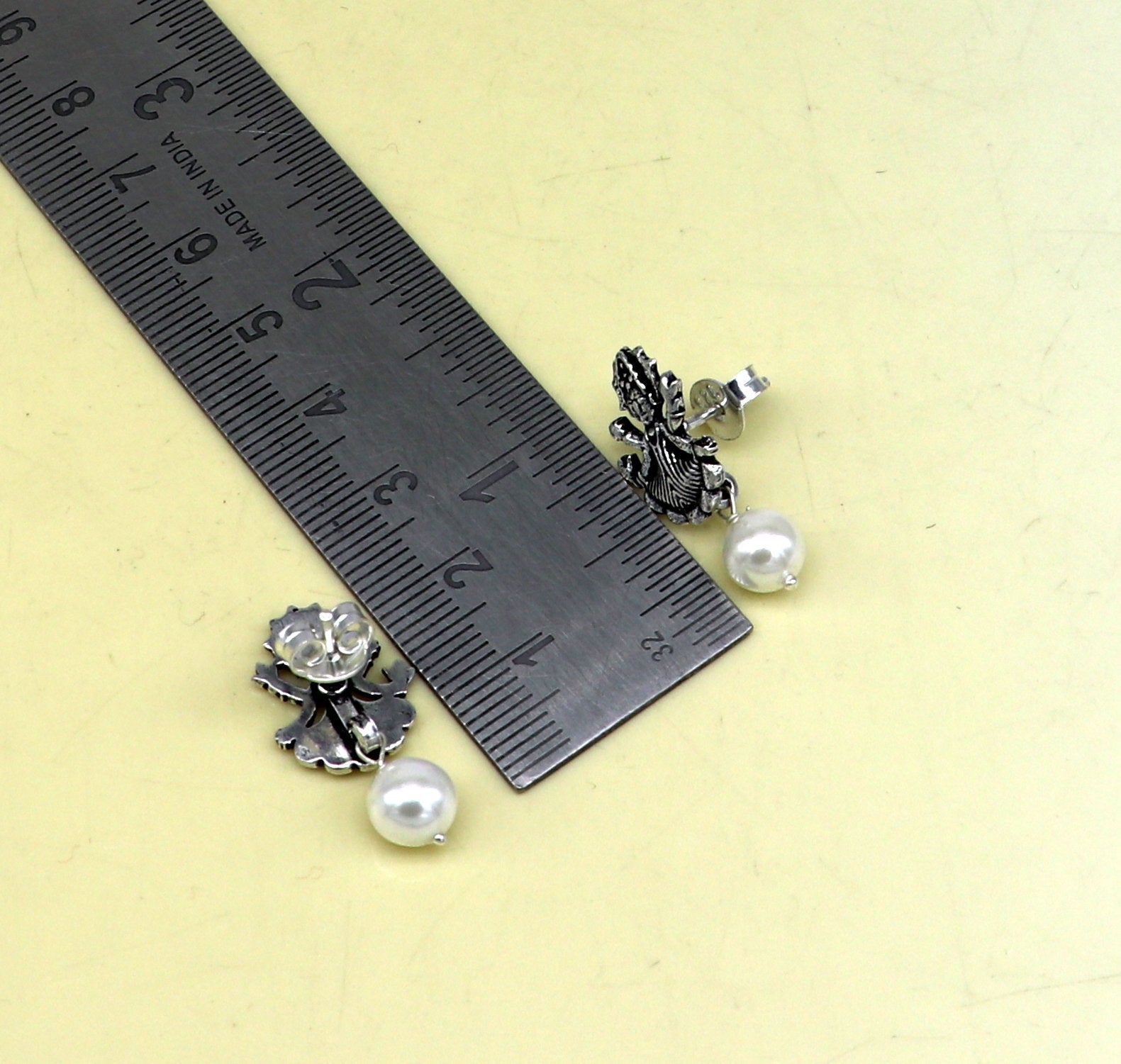 Sterling silver tribal deity goddess stud earring with dangling mother of pearl, handmade designer jewelry by TRIBAL ORNAMENTS.