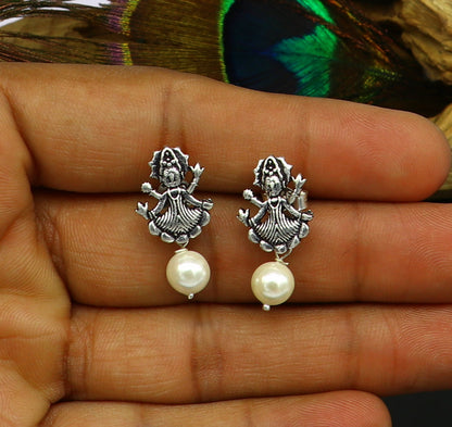 Sterling silver tribal deity goddess-style stud earring with dangling mother of pearl, handcrafted by Tribal Ornaments.