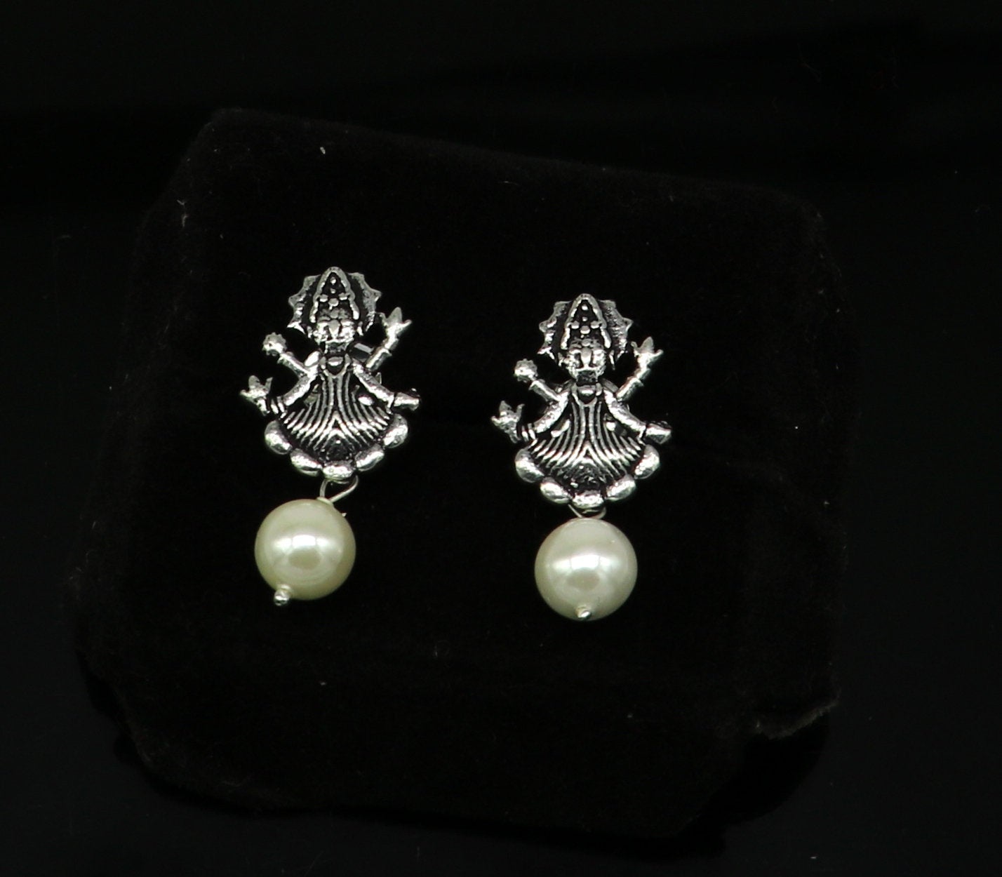 Sterling silver tribal goddess stud earring with dangling mother of pearl, handcrafted and customized by Tribal Ornaments.