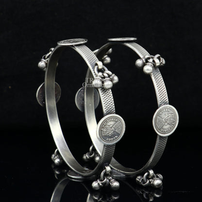 Sterling silver ethnic bangle bracelet with vintage style hanging drops, handcrafted by TRIBAL ORNAMENTS.