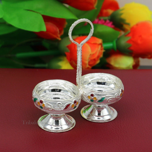 Handmade 925 sterling silver puja utensils, including a silver Tilak bowl and kumkum patra, crafted by TRIBAL ORNAMENTS.