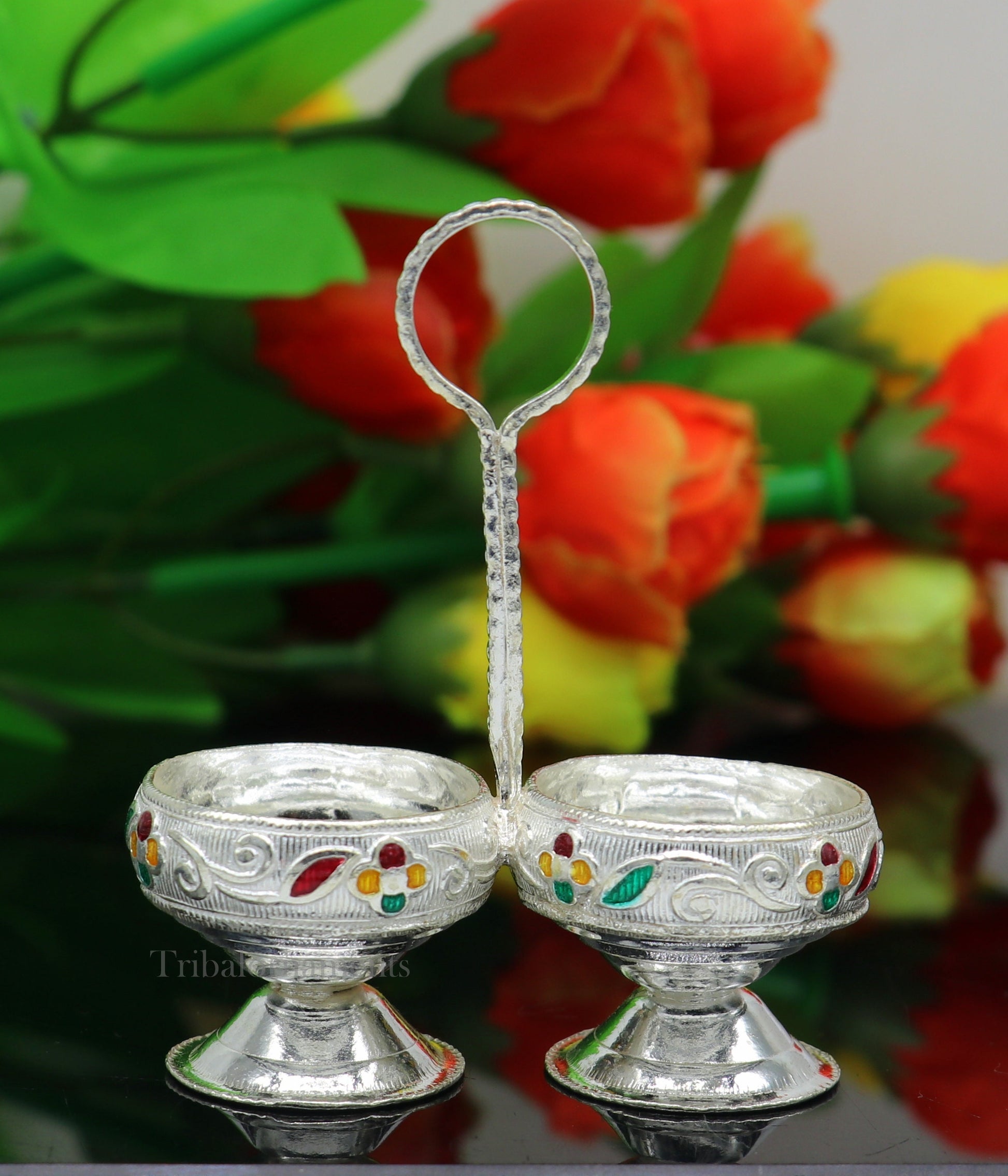 Handmade 925 sterling silver puja utensils including Tilak bowl and kumkum patra, crafted by Tribal Ornaments.
