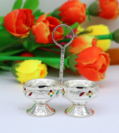 Handmade 925 sterling silver puja utensils including a Tilak bowl and kumkum patra, crafted by TRIBAL ORNAMENTS.