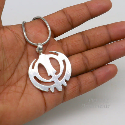 925 sterling silver Holy Khalsa Waheguru pendant featuring Sikh Sardar symbol, handcrafted jewelry from Tribal Ornaments.
