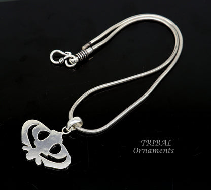 Sterling silver Khalsa Waheguru pendant with Sikha Sardar symbol, handmade jewelry featuring religious and cultural design.
