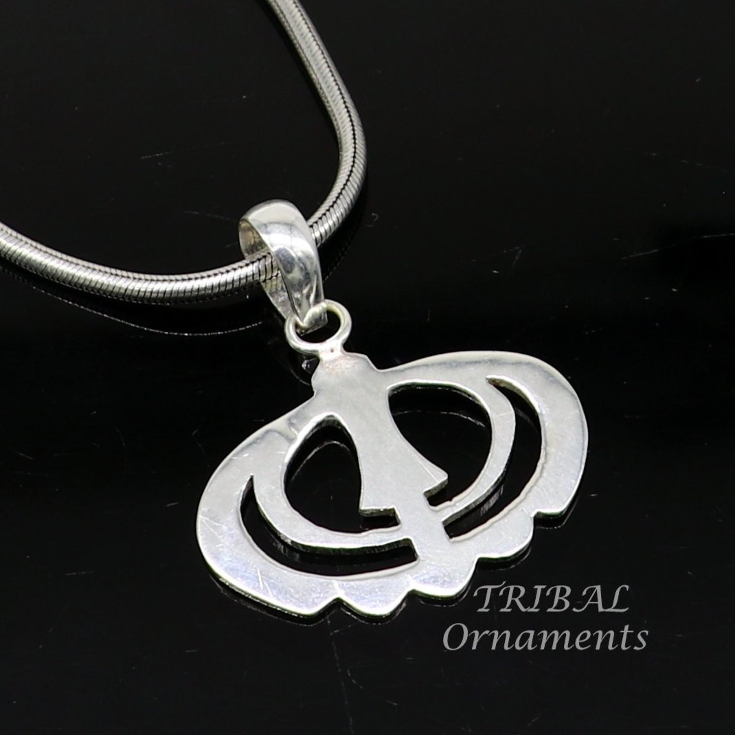 Sterling silver Khalsa Waheguru pendant with Sikh Sardar symbol, handmade by Tribal Ornaments, representing spiritual blessing and faith.