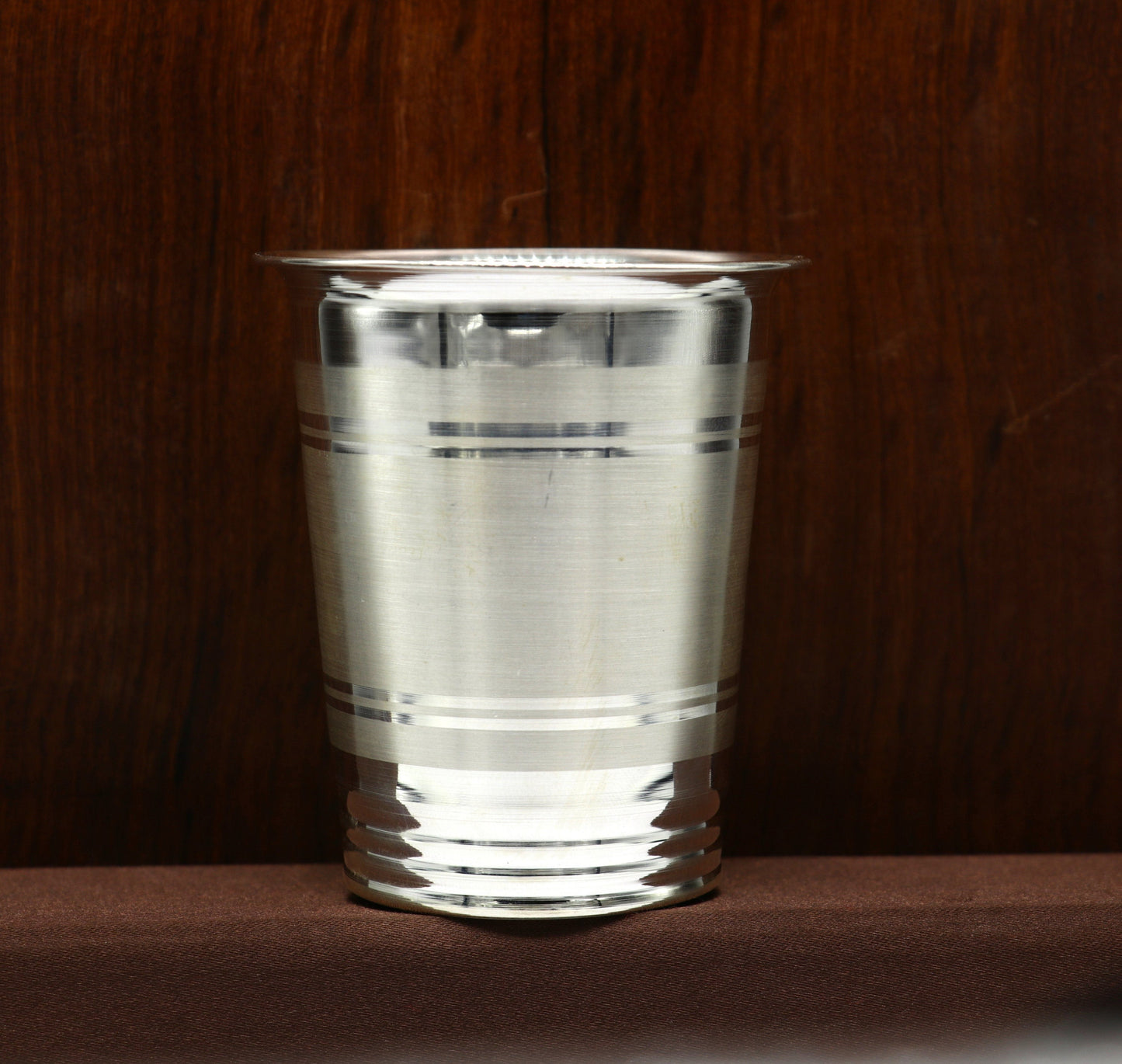 925 sterling silver handmade baby water or milk glass cup by TRIBAL ORNAMENTS, featuring intricate design and silver utensil style.