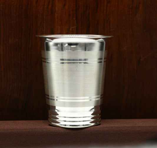 925 sterling silver handmade baby water or milk glass cup by TRIBAL ORNAMENTS, featuring intricate design and silver utensil style.