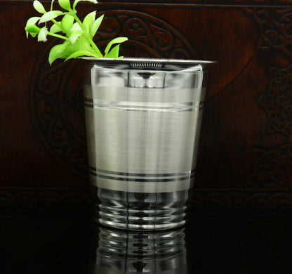 925 sterling silver handmade baby water or milk glass cup by Tribal Ornaments, featuring intricate design and silver utensils.