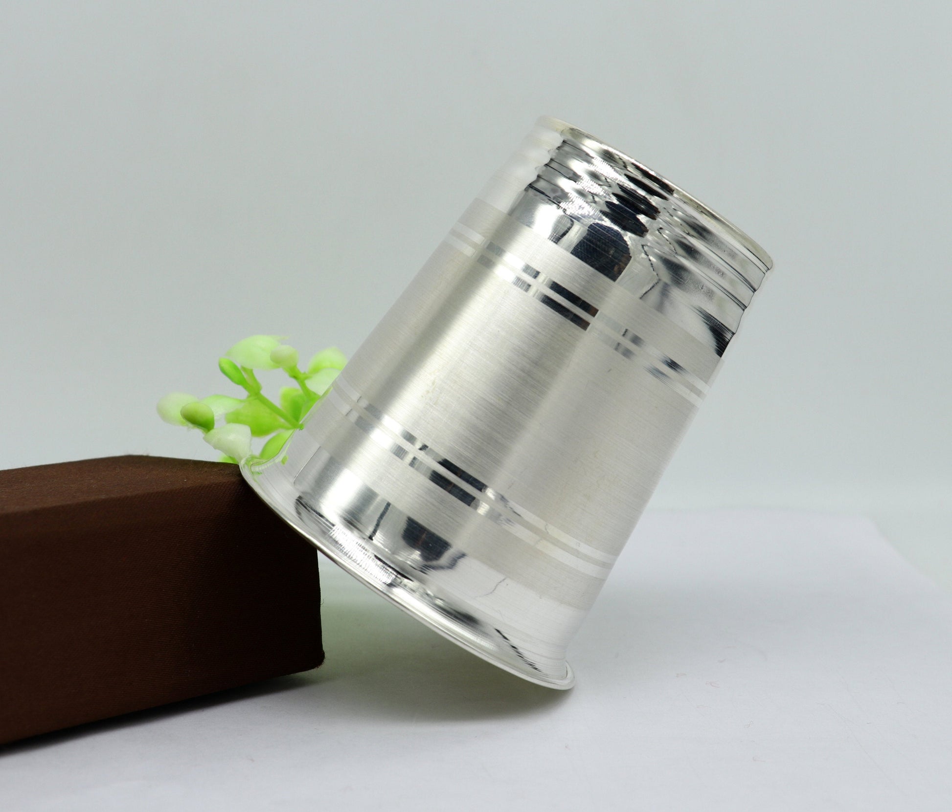 Handmade 925 sterling silver baby food cup with water or milk glass design, from TRIBAL ORNAMENTS, ideal for gifting.