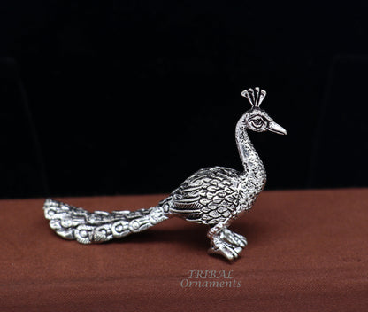 Handmade 925 sterling silver peacock statue featuring Lord Kartikeya's vahan, ideal for home temple decor by TRIBAL ORNAMENTS.