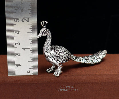 Handmade 925 sterling silver peacock statue depicting Lord Kartikeya's vahan, suitable for home temple decor and silver art collection.
